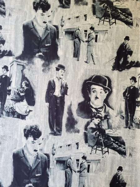 Ύφασμα επίπλωσης και κουρτίνας με ασπρόμαυρες φιγούρες του CHARLIE CHAPLIN σε γκρί vintage φόντο
